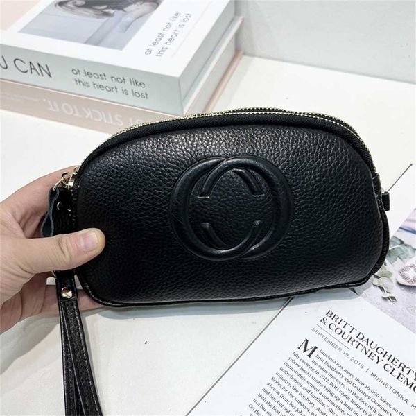 As mulheres de couro genuíno são populares. Bolsa feminina com borla fofa camada superior de couro bovino de um ombro crossbody pequena bolsa quadrada modelo 8756