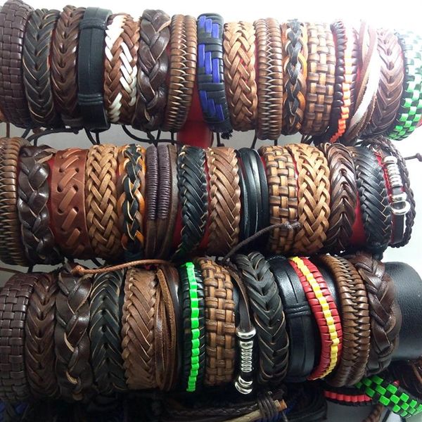 Pulseiras inteiras de couro genuíno para homens e mulheres, 100 peças, vintage, punho de surfista, presente de festa, estilo misto, joias da moda, lotes286s