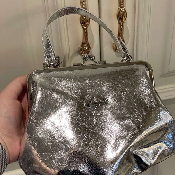 Imperatriz Dowager Silver Elephant Pattern Bolsa de bolsa de bolsa cruzada versátil e pequeno estilo Vivian Chain Bag
