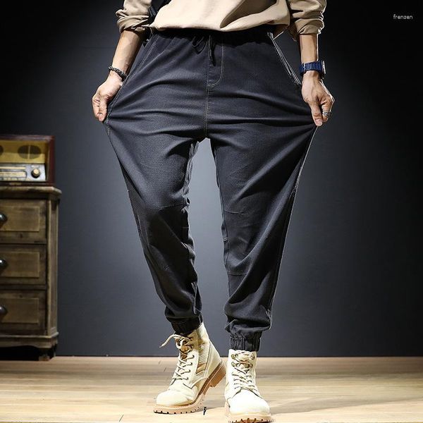 Pantaloni da uomo Pantaloni larghi con giunture Leggings casual Abbigliamento alla moda Harem Tute versatili Jogging