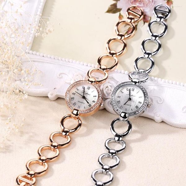 Orologi da polso Orologi da coppia Orologi da donna di lusso alla moda Orologio da polso in lega piccolo delicato quarzo con numeri arabi