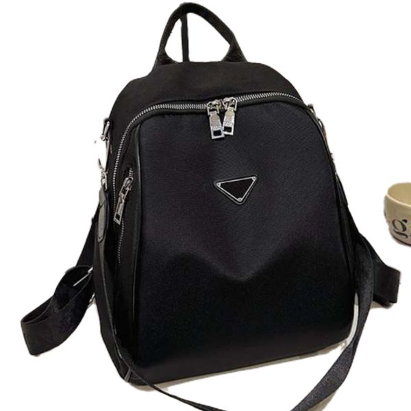 Luxustaschen Damen Schwarzer Rucksack Metalldreieck Logo Reisetasche Schultaschen Outdoor Freizeittaschen Marke Damen Herren Größere Computertaschen Herren Beackpack Aufbewahrungstaschen