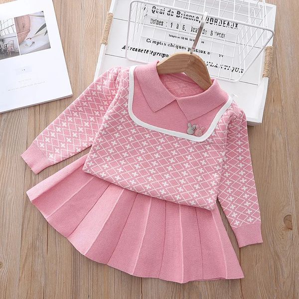 Set di abbigliamento Set di maglioni di moda per ragazza Set di due pezzi di cotone a maniche lunghe in cotone carino per bambini Gonna di maglione lavorato a maglia stile college per bambini 230927