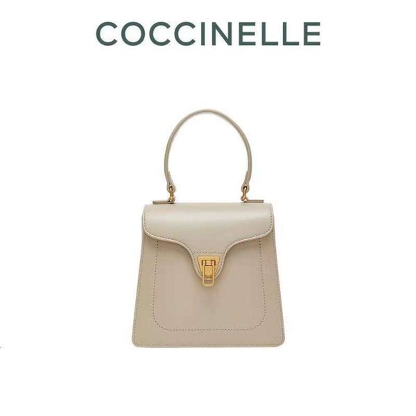 Coccinelle cocknell bate bloqueia fivela nicho de moda de luxo luxo de luxo de luxo de luxo versátil crossbody carregando letra de bolsa de ombro para mulheres