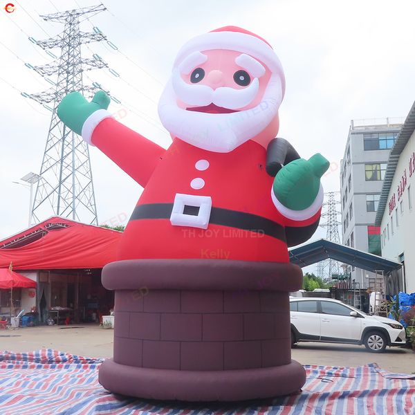 Attività all'aperto Babbo Natale gonfiabile gigante da 20 piedi sul modello pubblicitario natalizio del camino con luce a led per la decorazione del cortile