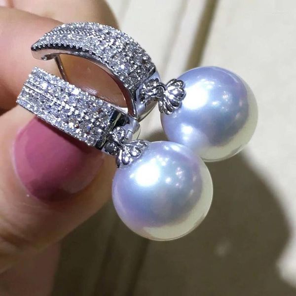 Orecchini pendenti Huitan moda perla simulata per le donne lusso pavimentato abbagliante CZ pietra estetica regalo di gioielli da sposa da sposa