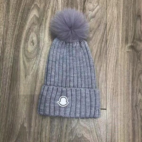 En iyi tasarımcı kış örme beanie yün şapka kadınlar tıknaz örgü kalın sıcak sahte kürk pom Beanies şapkalar kadın binnet bere kapakları yeni stil 11 renk