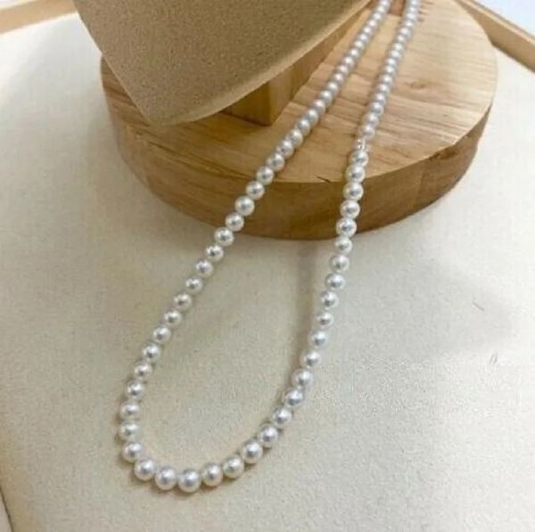 Ciondoli Ciondolo AAA Collana di perle bianche naturali del Mar Cinese Meridionale da 56 mm con fibbia in oro 14k 231010
