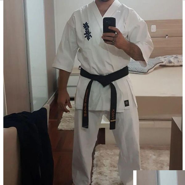 Equipamento de proteção Equipamento de proteção de alta qualidade Kyokushinkagbok 12oz 100% algodão lona karate uniforme quimono gi pano para crianças adt branco dhtcz