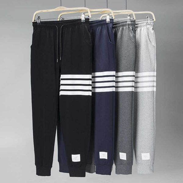 Calças de venda quente para calças casuais masculinas outono calças sanitárias confortáveis versão coreana tendência solta ajuste calças esportivas de pé pequeno para calças masculinas