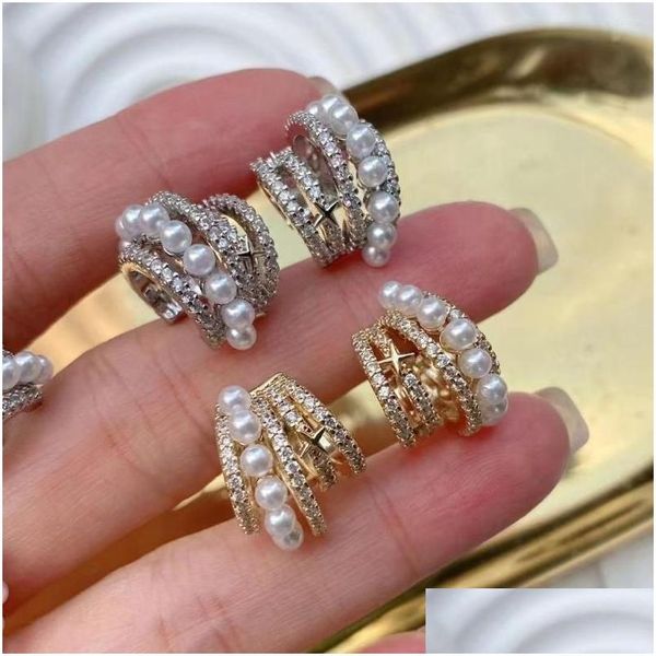 Orecchini a cerchio Huggie Hoop 4 paia 2023 Vintage coreano oro / argento colore conchiglia clip di perle per le donne gioielli dolce cerchio gioielli Earrin Dhwhk