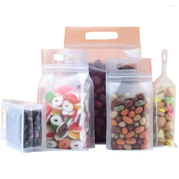 Sacos de armazenamento 50pcs Matte Clear Plastic Stand Up Bag com alça Resealable Reclosable Rasgo Notch Doypack Food Candy Chocolate Pack