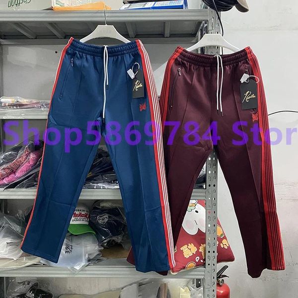 Pantaloni da uomo Immagine reale Farfalla ricamata con tasche laterali con cerniera in tessuto per lavorazione a maglia Awge