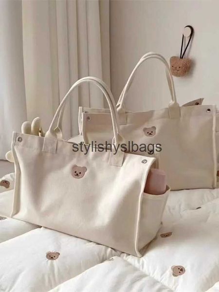 Sacos de ombro Sacos Coreano INS Mommy Bag Multifuncional Canvas Tote Portátil Outgoing Fasion Grande Capacidade Moter e Baby Mom Bagstylishyslbags