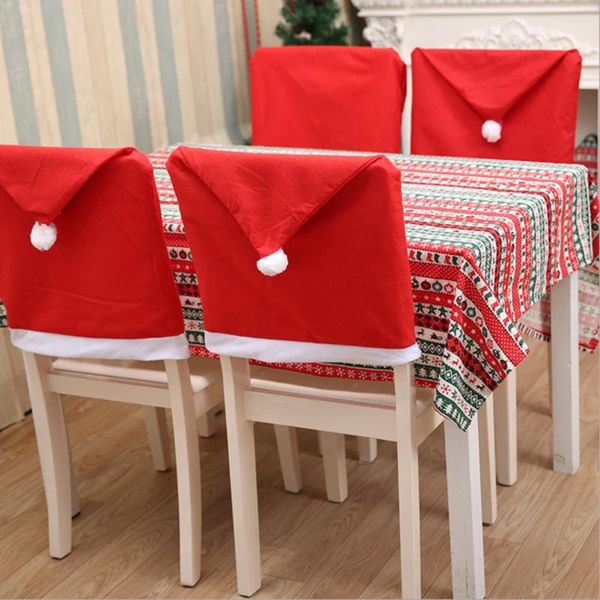 Sandalye 4pcs Dokuma Olmayan Kumaş Yemek Noel Mutfak Dekor Evrensel Noel Baba Şapkası 25 Ev Yemeği için
