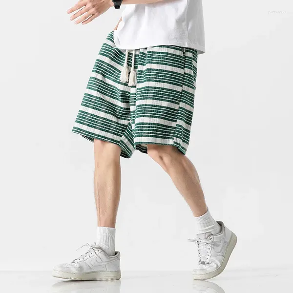Pantaloni da uomo Pantaloncini sportivi a righe a blocchi di colore retrò estivi per ragazzi Marchio di moda Gamba larga ampia Casual Versatile Spiaggia a cinque punti