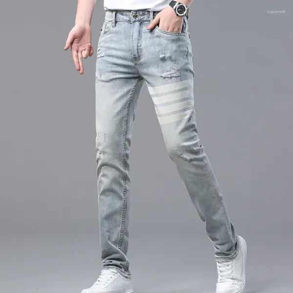 Erkek kot pantolon ile zıt renkler ile basit çizgiler erkek marka insanlık ince jean Avrupa moda gündelik trendy pantolon