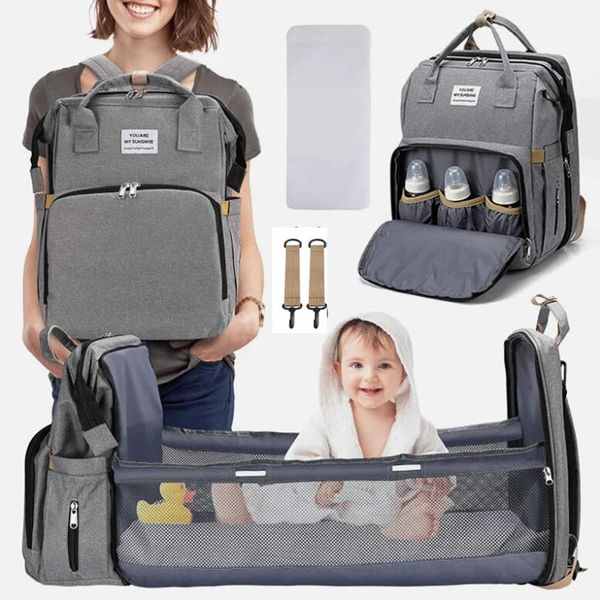 Bezi çantaları katlanabilir bebek beşik çanta ile değişen ped ile mumya sırt çantası usb arayüz bakım doğumlu bebek arabası organizatörü 231019