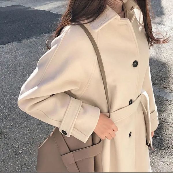 Kadın yün harmanlar kış yünlü ceket kadınlar Kore Katı moda zarif kalınlaşmış sıcak uzun ceket dişi gevşek kapalı düğme kayışı dışarısı 231021