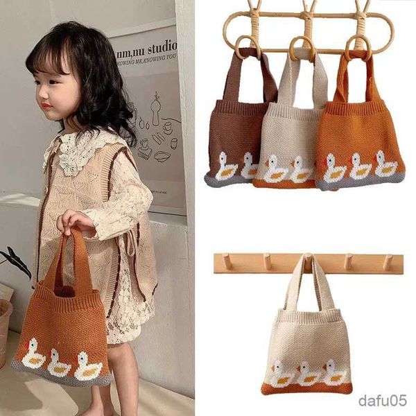 Borse Borse per bambini per ragazze Borsa piccola lavorata a maglia con anatra in cartone animato Borse per bambini autunno inverno Borsa portatile Borsa per riporre snack per monete