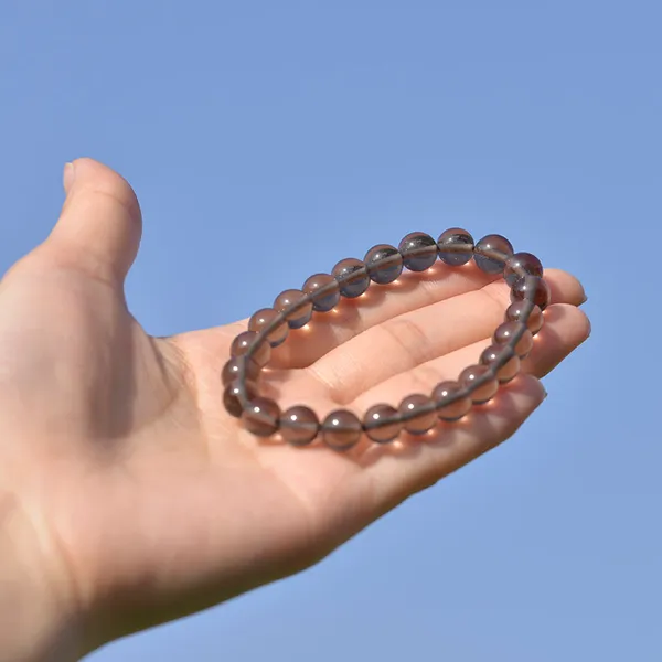 Bracciale in pietra naturale al quarzo fumé da 8 mm. Perle di energia per il potere curativo della pietra preziosa. Bracciale con perline rotonde in pietra elasticizzata elastica