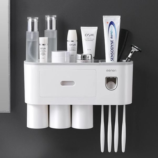 Suportes de escova de dentes Adsorção magnética Suporte de escova de dentes invertida Rack de armazenamento de parede Punch-livre Espremedor de pasta de dente automático Acessórios de banheiro 231025