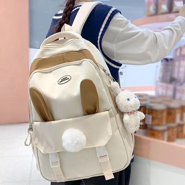 Sacos escolares menina viagem bonito dos desenhos animados livro mochila feminino branco portátil saco de náilon na moda senhora kawaii faculdade moda feminina mochila