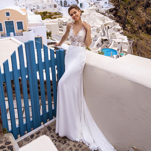 Abito da sposa classico con applicazioni in pizzo con scollo a V. Abiti da sposa a tubino lungo con tromba su misura