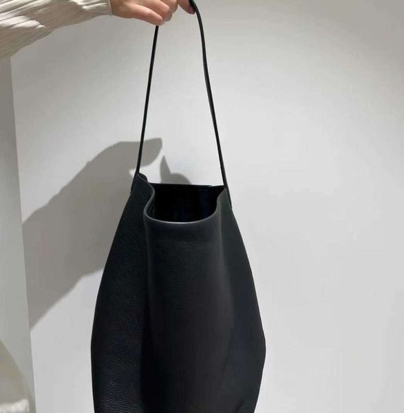 2024 novo designer saco a linha balde saco pequeno grande e versátil nova bolsa de grande capacidade ombro único portátil tendência de moda de couro real