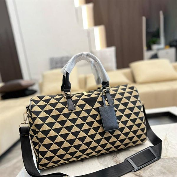 Uomo Donna Borsa da viaggio ricamata da 45 cm Borsone in tessuto beige nero Manici in pelle Borsa da viaggio con tracolla239V