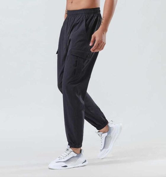 Eğlence spor pantolonlar Men039s yoga kıyafetleri açık hava hızlı kurutma tozluk gevşek dokuma ayak bağlama fitness tulum dağları 7509908