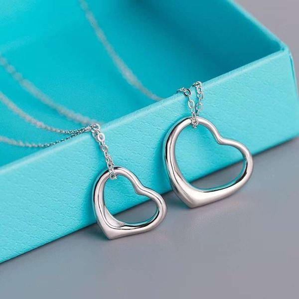 2024 Fashion Schmuck Designer Tiffanyitss Anhänger Halsketten Halskette Klassische Hollow Heart S925 Sterling Silber Damen Liebe Schmuck mit Kasten NXXXG