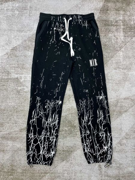 pantaloni della tuta neri pantaloni della tuta da uomo pantaloni della tuta larghi cintura elastica racchiusa e tasche con cerniera con coulisse decorazione della lettera pantaloni casual spessi Hip-hop