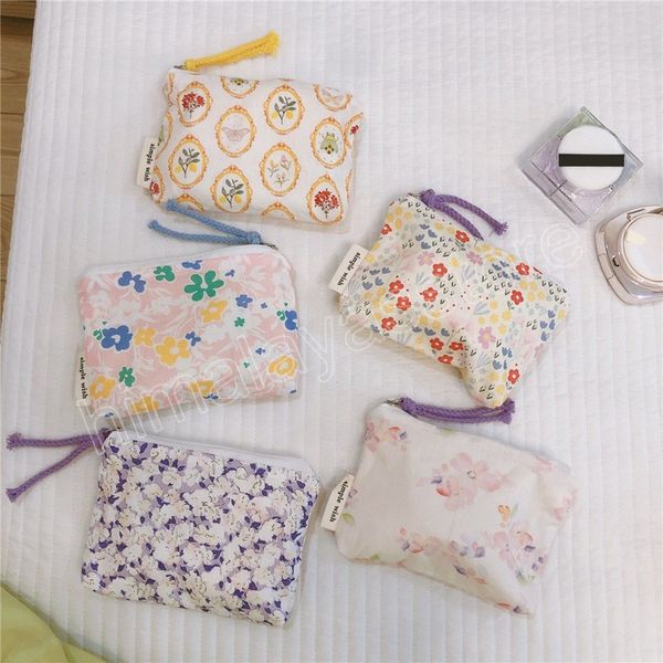 Mulheres estampas de flores maquiagem batom saco de fones de ouvido Organizador de viagens Doce meninas Bolsa de armazenamento de guardanapo de guardanapos sanitários