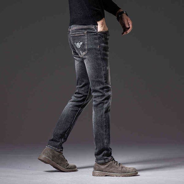 Jeans da uomo estivi versione coreana colla stampata strofinata a mano pantaloni di marca elasticizzati slim fit piccoli