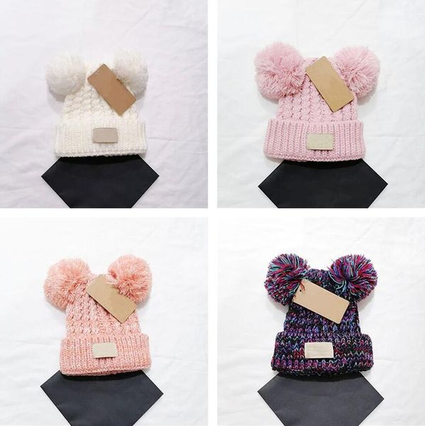 Cappelli lavorati a maglia con doppia palla di pelo alla moda Cappellino con pompon per adolescenti Mantieni caldo Cappello invernale per bambini all'aperto Cappello a cuffia per bella ragazza