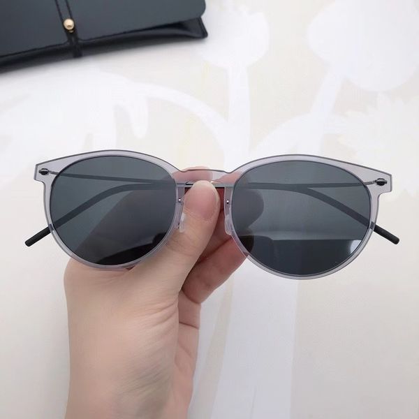 Солнцезащитные очки 2022 Дизайн бренда Солнцезащитные очки женщины Мужчины Дизайнерские модные титана негабаритные солнце