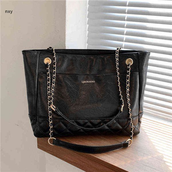 Totes Einkaufstasche Designer-Handtasche Große gesteppte Kettenarbeits-Schultertaschen für Frauen Luxusmarken-Handtaschen Winter Schwarz Weiß 1116