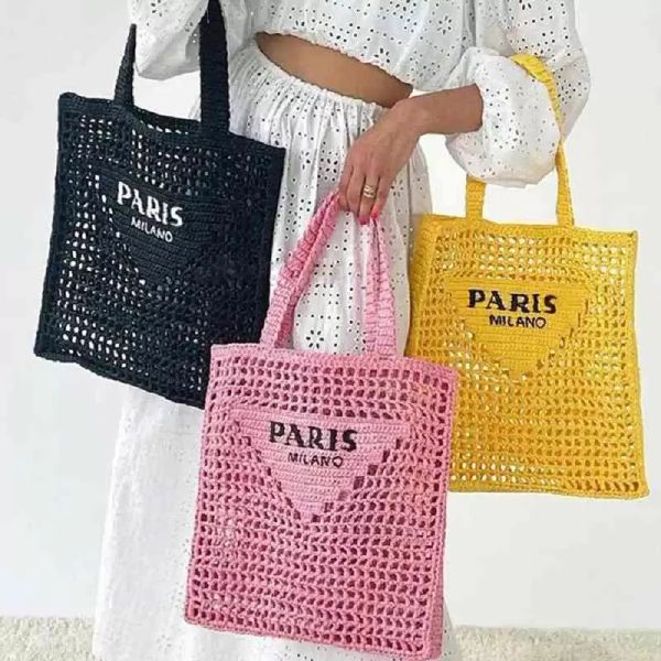 2022 Hot Ins Designer Brands Hollow Letters Rafia Straw Tote Fashion Paper Woven Women Shoulder Bags Summer Beach Borsa Borsa di lusso