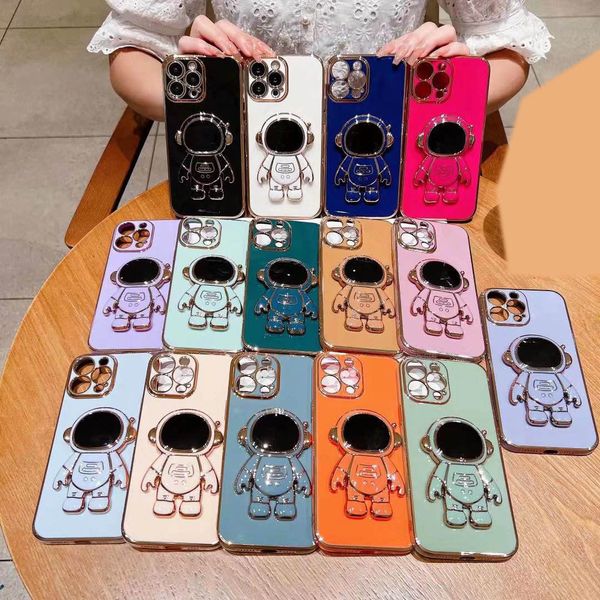 Con custodie per supporto staffa Space Astronaut per Iphone 15 14 Plus Pro MAX 13 Mini 12 11 XR X XS MAX 8 7 Bling Soft TPU Luxury Cute cromata copertura metallica per cellulare