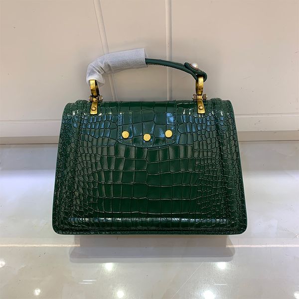 Bolsas de marca para mulheres de alta qualidade Padrão de crocodilo de alta qualidade Sacos diagonais de um ombro barroco design pérola metal fivela moda retro versátil 2022