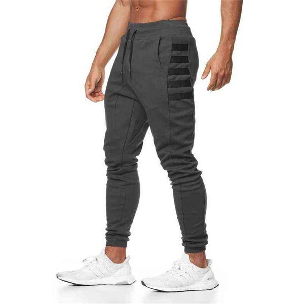 Calças masculinas Novo calça de corrida de ginástica Casual Men Sports Men's Jogger Fitness Troushers Novo moda Muscle Muscle Mens Training Sports Pants T220909