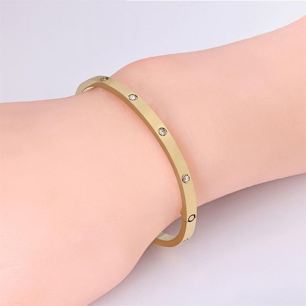 Маленькая модель 10 камней -манжеты Слим Любовные Браслеты Bangles for Women Мужчины AAA Кубическая циркония 316L Титановые стальные украшения с ключом SUNTDRI309L