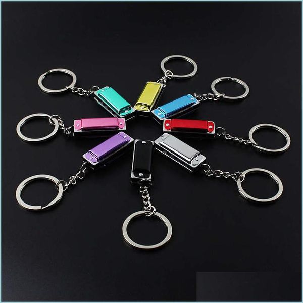 Anéis -chave 100pcs/lote metal 4 buracos mini gaita de keychain Kids Toys Keyring Kids Gifts Key Chain Bags Rings Mobile Rings C3 Drop dell Dh2zn
