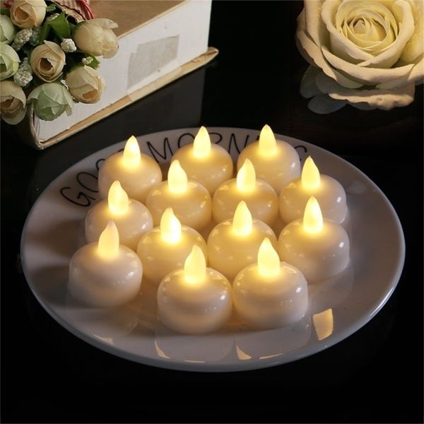 Candele 36 pezzi Lampada tremolante senza fiamma impermeabile che galleggia sull'acqua Luci da tè a batteria in plastica a led per piscina spa 220919