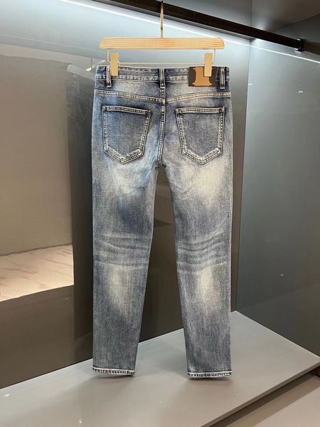 Jeans da uomo firmati strappati jeans lavati alla moda di colore chiaro pantaloni classici da uomo retrò elasticizzati