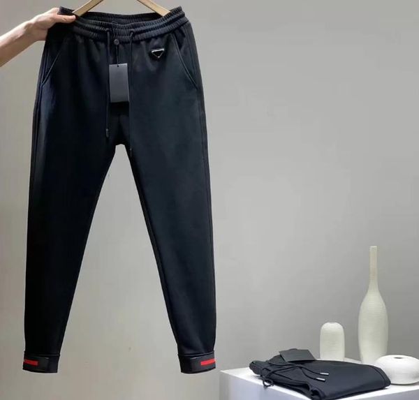 Novo etono de inverno masculino calças de calças clássicas moda sexy calça calça de moletom eu americano bordado de letra importada de bordado ajustável