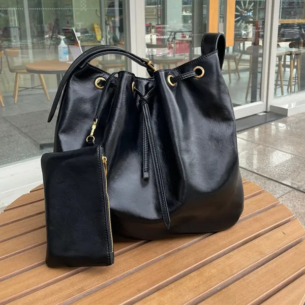 Bolsas de luxo de designer bolsa de ombro redonda tesouro acolchoada pele de cordeiro macia couro real crossbody metal antigo para mulheres bolsa de balde bolsa de corrente de couro de cera de óleo