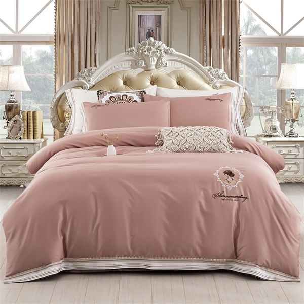 Set di biancheria da letto stile europeo 60 cotone a fiocco lungo ricamato tinta unita lenzuola in quattro pezzi biancheria da letto in cotone rosso all'ingrosso rosa 220924