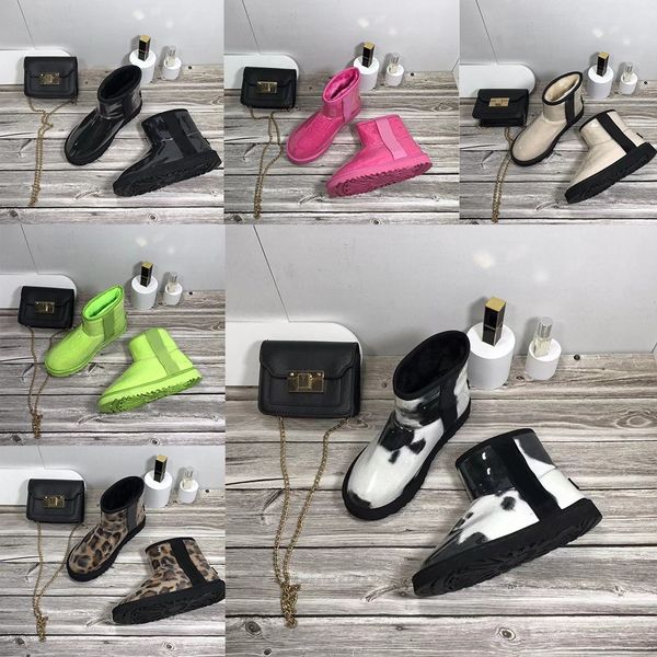 Designer New Snow Boots Botas Winter Feminino Botas ￠ prova d'￡gua Moda preta rosa Prote￧￣o a frio fria feminina quente algod￣o Botas curtas com tamanho de caixa 35-40